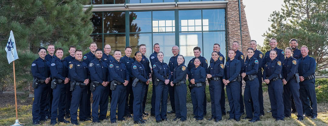 Police officers in uniform at Douglas County Sheriff's Office.